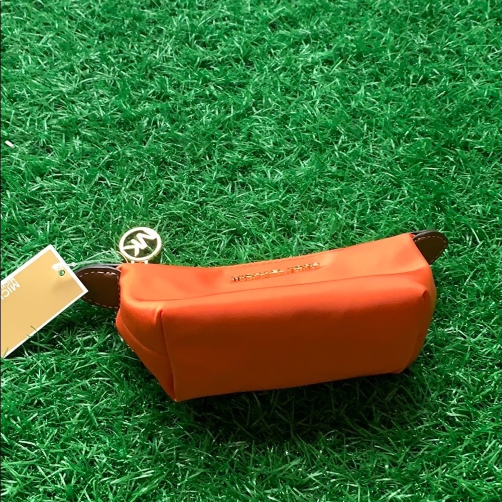 MICHAEL KORS TRAVEL XS POUCH TANGERINE - Picture 8 of 16
